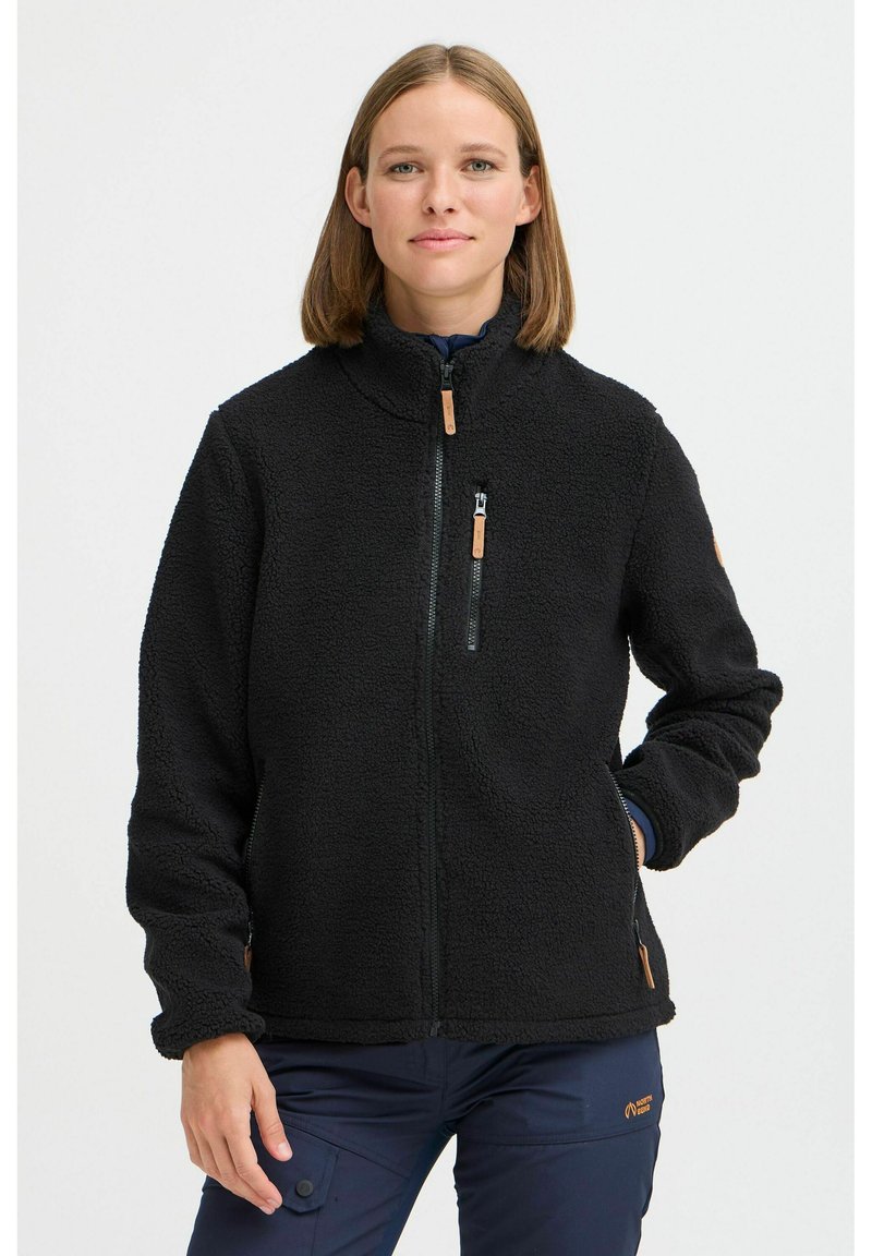 Veste en polaire noire avec un col haut, fermeture éclair avant et poches latérales. Présente un tissu texturé et un accent en bois sur la fermeture éclair.