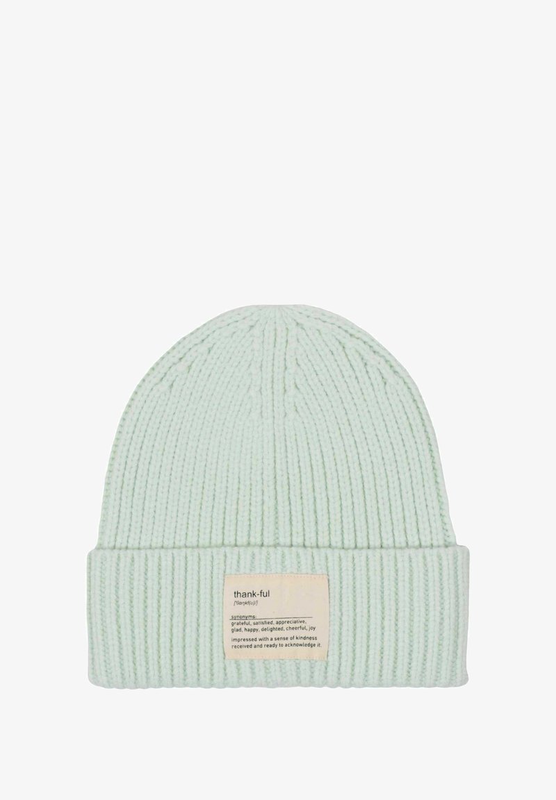Mint green knitted beanie with a ribbed texture and a folded cuff. Features a label with the word "thank-ful" and its definition sewn on the front.