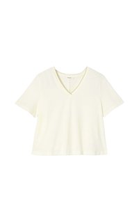 T-shirt à col en V de couleur crème clair avec des manches courtes, fabriqué en tissu doux. Coupe simple et décontractée sans motifs ni détails matériels visibles.