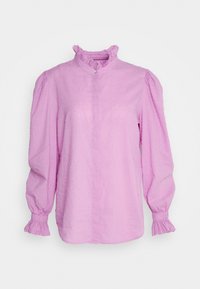 Light pink blouse with ruffled collar and cuffs, textured fabric with raised dots, button-down front, and puffed sleeves.