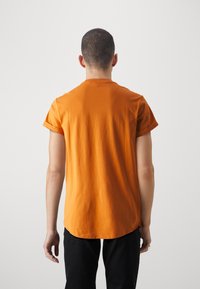 G-STAR LASH - Tricou basic - orange