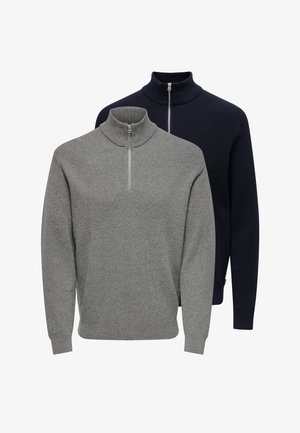 Deux pulls à col zippé : l'un gris avec une texture côtelée, l'autre bleu marine. Les deux ont des manches longues et une coupe standard, avec un tissu lisse.