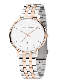 Silberne und roségoldene Metalluhr mit einem weißen Zifferblatt, minimalen Stundenmarkierungen und einer Datumsanzeige. Verfügt über ein Gliederarmband-Design.