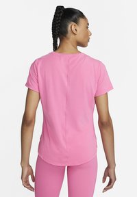 Nike Performance ONE LUXE - T-shirt desportiva - pinksicle/reflective silv