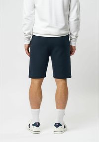 U.S. Polo Assn. MALIK - Teplákové kalhoty - dark sapphire