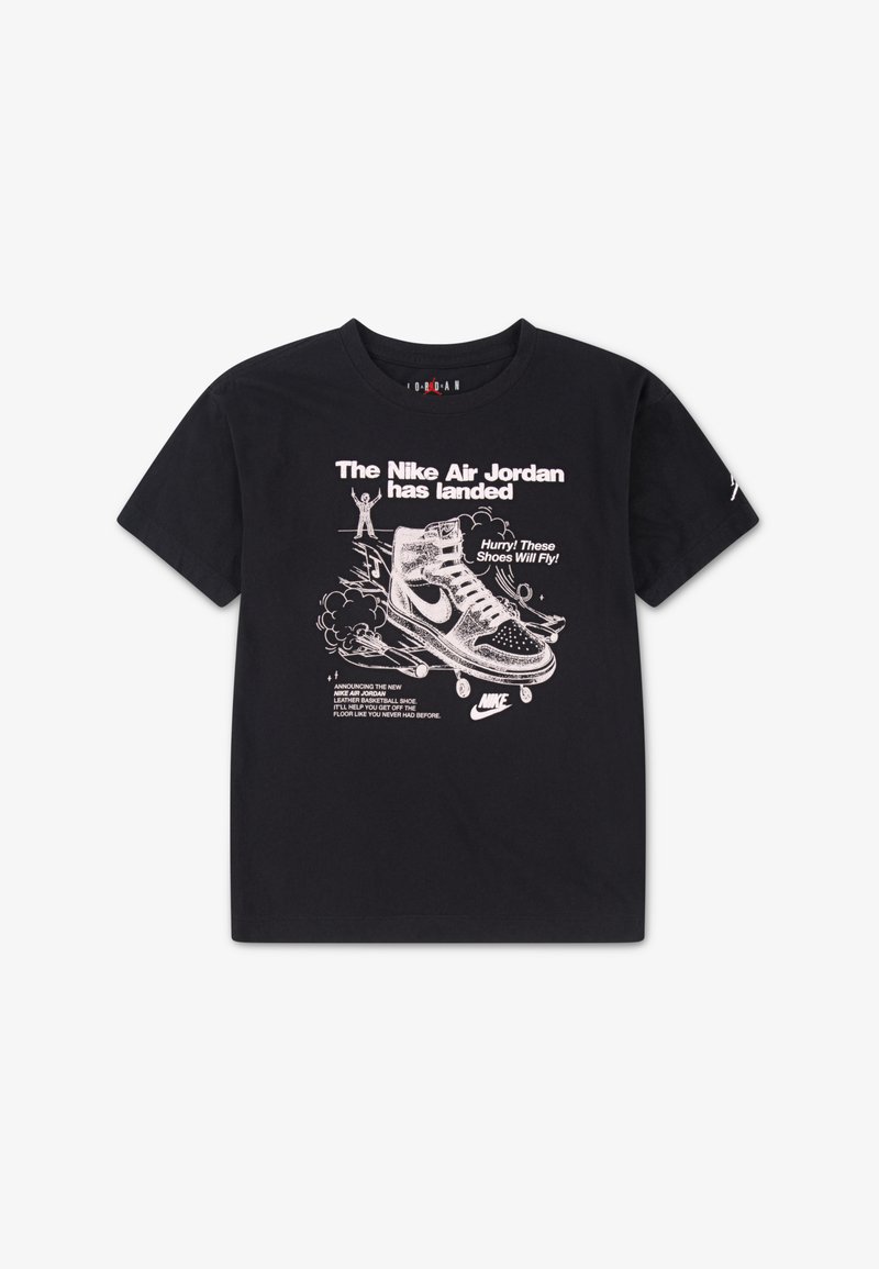 Svart bomull T-skjorte med grafisk design av en høyhælte sneaker og tekst som promoterer Nike Air Jordan, med hvite og rosa detaljer.