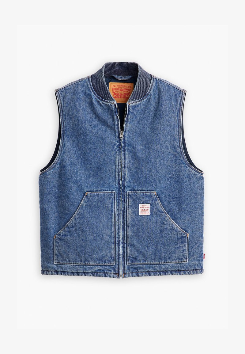 Gilet in denim con zip frontale, colletto a costine, due tasche anteriori e etichetta. Presenta un classico lavaggio blue e un design strutturato.