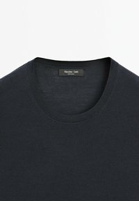 Dark gray knitted crewneck sweater with a ribbed texture. Features a label reading "Massimo Dutti." Simple and seamless design.