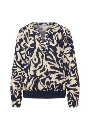 Langærmet bluse med navyblåt og kremfarvet abstrakt blomsterprint, V-hals og tætsiddende navyblåt taljebånd og manchetter.