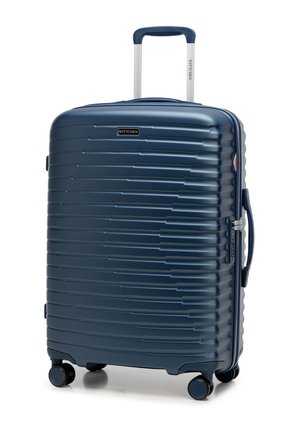 Dark blue hard-shell suitcase with textured surface, four spinner wheels, retractable handle, side handle, and built-in TSA lock.