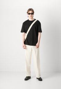 Calvin Klein Jeans COLORBLOCK TEE - Camiseta estampada - black