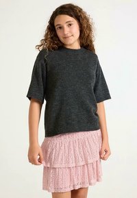 Dark gray short-sleeved knit sweater paired with a light pink lace ruffled skirt. Sweater has a rounded neck and a relaxed fit.