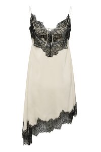 Κρεμ φόρεμα slip με μαύρη δαντέλα στο ντεκολτέ, στο τελείωμα και στο στήθος, με λεπτές τιράντες και βαθύ V-λαιμό με μικρό φιόγκο.