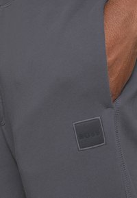 BOSS SESTART - Calças de fato de treino - dark grey