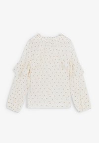 Blusa bianca con piccoli motivi quadrati color ruggine, maniche a volant e scollatura arricciata. Tessuto leggero e testurizzato con una vestibilità comoda.