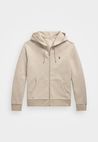 Beige zip-up hoodie tillverkad av mjuk bomullsblandning. Har en framficka, justerbar huva och en liten broderad logga på vänstra bröstet.