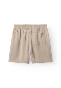 Beiget lyhyet housut, valmistettu kevyestä kankaasta, joissa on joustava vyötärönauha, yksi takatasku ja sileä pinta.