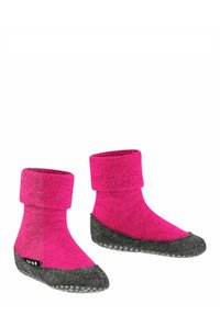 Calze a maglia rosa con risvolto e suole in feltro grigio dotate di puntini antiscivolo, progettate per comfort e aderenza.