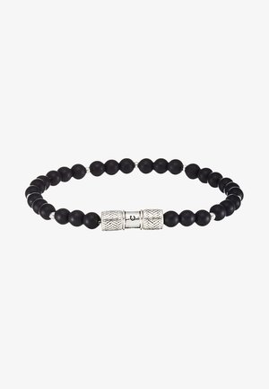 Czarny bransoletka z koralików składająca się z matowych, czarnych kulistych koralików, przeplatanych srebrnymi metalicznymi akcentami zdobionymi teksturowanym wzorem.