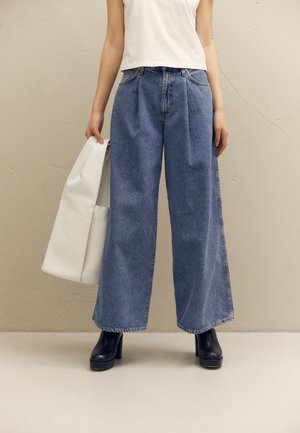 Goldsign THE ATTICUS - Platėjantys džinsai - gibson/vintage blue