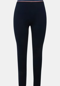 Marina leggings gjorda av mjukt tyg med en figurnära design. Relaxed midja med en tunn färgad rand som accent. Slät textur.