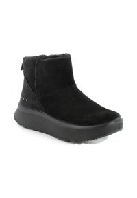 Stivale alla caviglia in suede nero con una morbida fodera in pelliccia, punta arrotondata e una spessa suola in gomma nera. Dispone di un pratico tassello sul retro per una facile calzata.