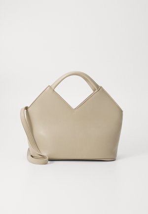 Beige structured handbag with a V-shaped top, smooth leather material, short handles, and a long adjustable strap. Minimalist design.