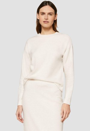 Lichtbeige sweatshirt met lange mouwen, gemaakt van zachte stof, met een ronde halslijn en een ontspannen pasvorm, gecombineerd met een bijpassende strakke rok.