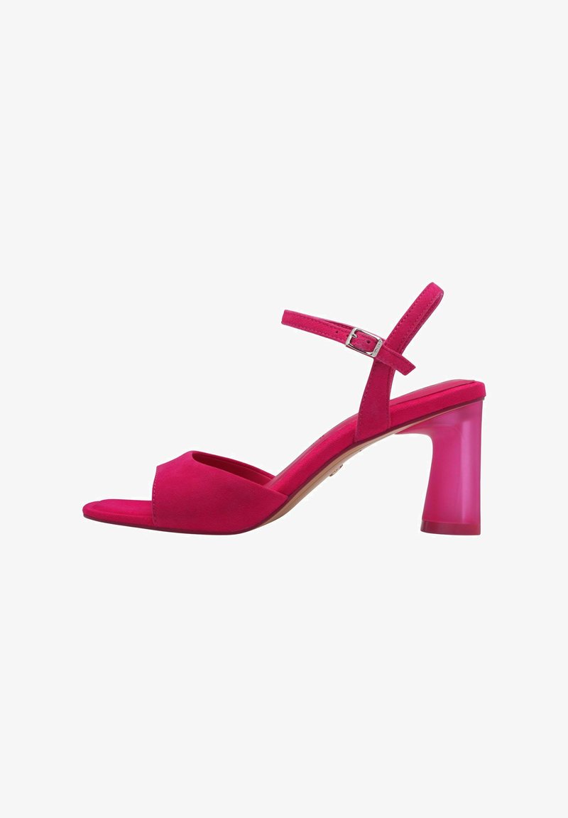 Rosa mocka öppen tå sandal med en rem och en genomskinlig, rosa blockklack. Har en smal ankelrem med en metallspänne. Slät textur.