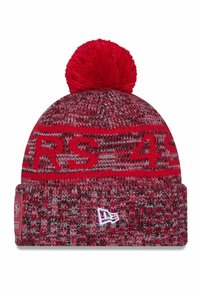 Red and gray knit beanie with a pom-pom, featuring a logo patch and bold text "49ERS" in red on the upper band. Textured pattern throughout.