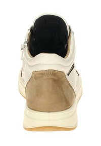 White and beige sneaker with a smooth leather upper, textured suede heel, and black lining. Features a side zip for easy wear.
