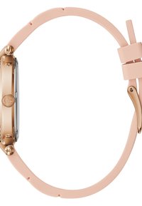 Orologio oro rosa con cassa rettangolare, quadrante trasparente e cinturino in silicone rosa chiaro. Presenta una fibbia in metallo lucido e un dettaglio con il logo.