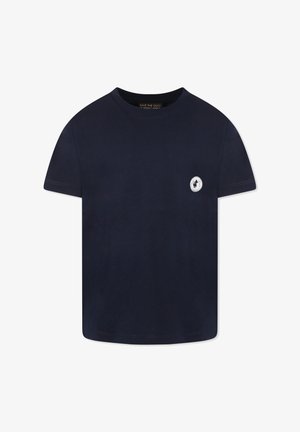 T-shirt in cotone blu navy con maniche corte, scollo rotondo e un logo bianco circolare con un'anatra sul lato sinistro del petto.