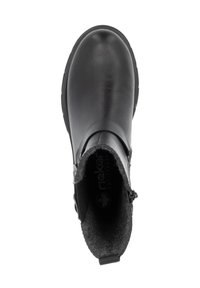 Botín de cuero negro con punta redondeada, forro de fieltro y cremallera lateral. Suela de goma para mayor tracción, diseño de tacón plano.