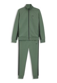 Žalias sportinis kostiumas iš lygaus audinio, turintis užtrauktuku užsegamą striukę su juodomis juostelėmis ir derančias kelnes; elegantiškas dizainas su ribinėmis rankogaliais.