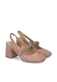 Blush pink suede slingback heels with a square toe, block heel, and embellished strap featuring multi-colored stones.