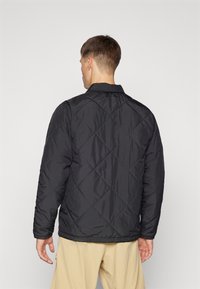 The North Face AFTERBURNER INSULATED - Jachetă outdoor - black/smokey brown