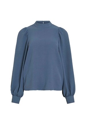 Blauwe lange mouwen top met hoge hals, gemaakt van textuurstof en met geraffineerde pofmouwen. Achterste sluiting met een klein sleutelgatdetail.