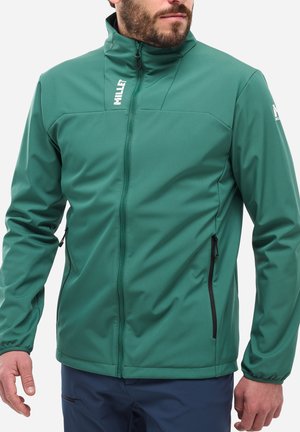Veste softshell verte avec un col haut, une fermeture éclair sur le devant et des poches latérales. Prend en charge un tissu lisse et texturé avec des fermetures éclair noires contrastantes.
