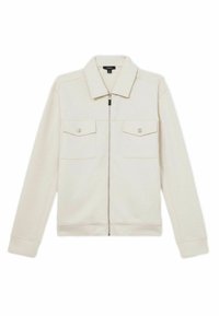 Lyse beige zip-jakke med krave, to brystlommer og ribbede manchetter. Fremstillet af blødt stof med en glat tekstur og diskret syning.