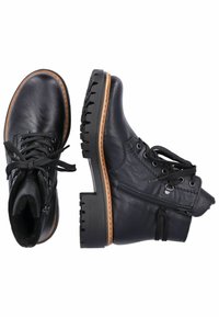 Black leather ankle boots with textured finish, round toes, lace-up design, side zip, rubber tread outsole, and contrasting tan sole.