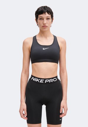 Nike Performance, BRA - Brassières de sport à maintien normal - black/white