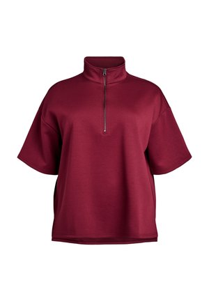 Burgunderfarbenes Halbhzip-Pulloveroberteil mit kurzen Ärmeln, aus weichem Stoff gefertigt, mit einem Stehkragen und einem eleganten Reißverschlussdetail.