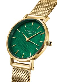 Gold mesh-Armband Uhr mit grünem, strukturiertem Ziffernblatt. Verfügt über goldene Stundenmarker und -zeiger, mit einem auf dem Ziffernblatt angezeigten Markenzeichen.