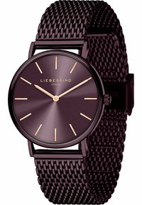 Runder lila metallicer Uhr mit einem strukturierten Mesh-Armband. Das minimalistische Design zeichnet sich durch roségoldene Akzente und einfache Stundenmarkierungen aus.