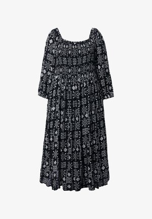 Zwarte midi-jurk met witte bloemen- en geometrische patronen, lange opgeblazen mouwen en een vierkante halslijn.