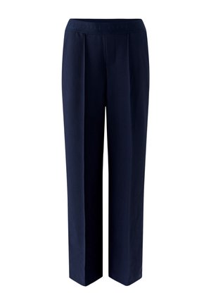 Pantalon plissé bleu marine avec une ceinture douce et extensible. Le tissu est lisse, avec une coupe large et ajustée sans éléments métalliques visibles.