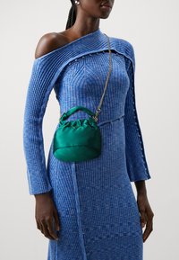 Guess TWILLER - Handtasche - green