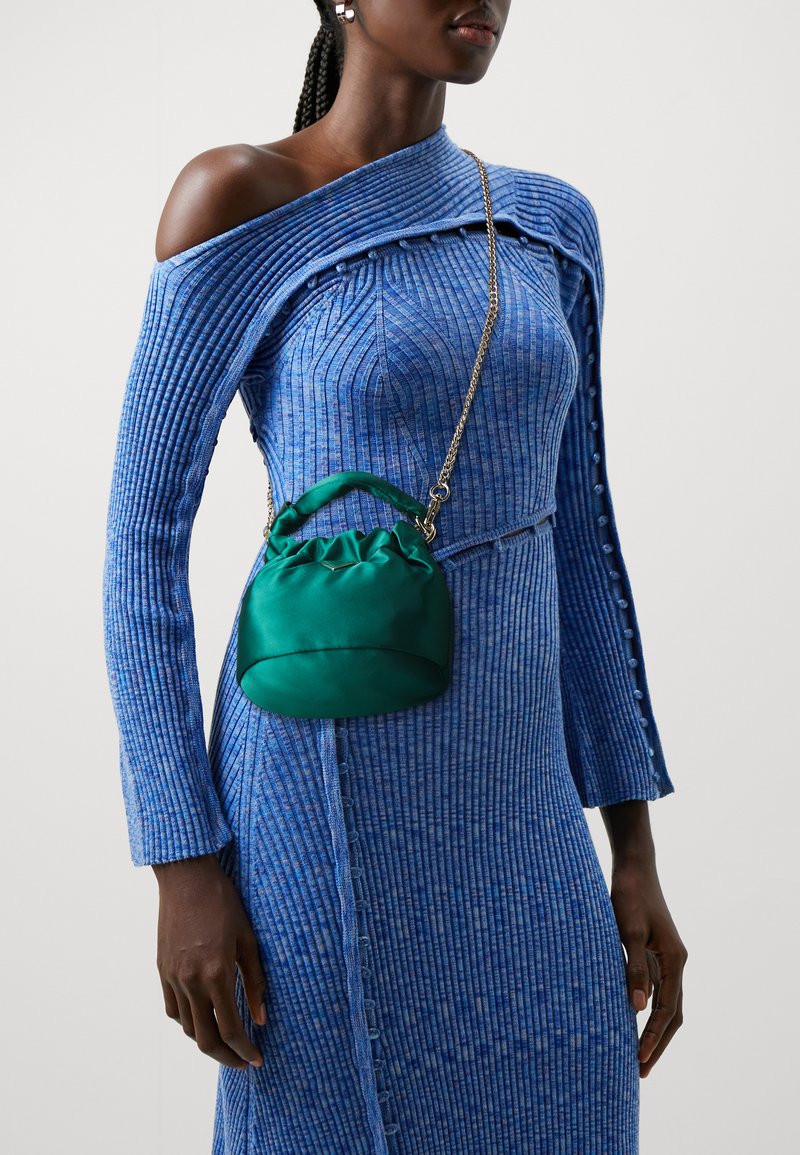 Guess TWILLER - Handtasche - green