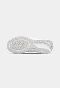 Semelle en caoutchouc blanc avec un motif de préhension texturé. Dotée d'une accentuation bleu clair avec le logo de la marque. Matériau en caoutchouc lisse, forme courbée.